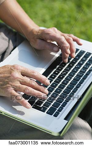 Senior woman using laptop View Large Photo Image Stock Photography - Senior woman using laptop. Fotosearch
