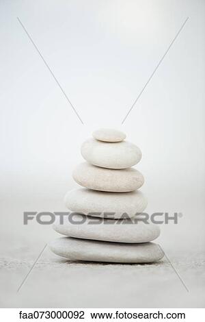 Stacked pebbles View Large Photo Image Stock Image - Stacked pebbles. Fotosearch