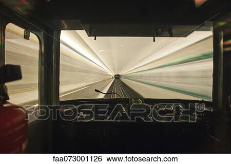 Train moving through tunnel, viewed through window View Large Photo Image Stock Photograph - Train moving through tunnel, viewed through window. Fotosearch