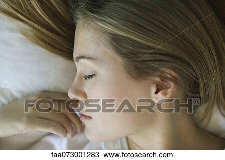 Stock Image - Woman sleeping, close-up. Fotosearch
