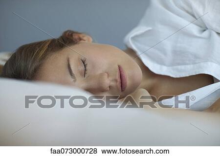 Woman sleeping View Large Photo Image Stock Photo - Woman sleeping. Fotosearch