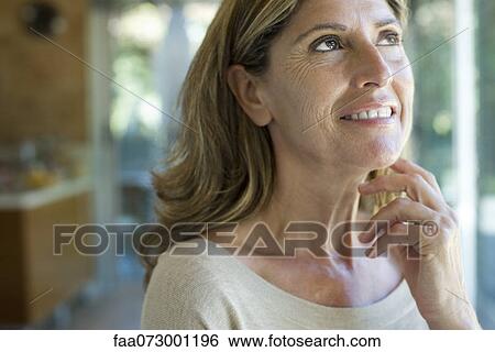 Stock Photograph - Woman smiling. Fotosearch
