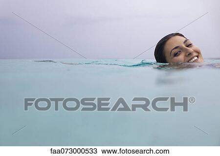 Woman swimming, portrait View Large Photo Image Stock Image - Woman swimming, portrait. Fotosearch
