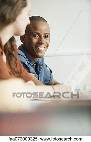 Young man hanging out with friend View Large Photo Image Stock Photography - Young man hanging out with friend. Fotosearch