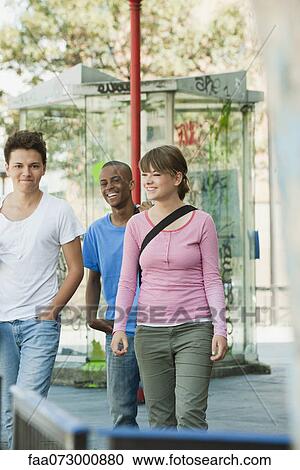Young people hanging out together View Large Photo Image Stock Image - Young people hanging out together. Fotosearch
