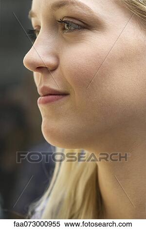 Stock Photography - Young woman in profile, portrait. Fotosearch