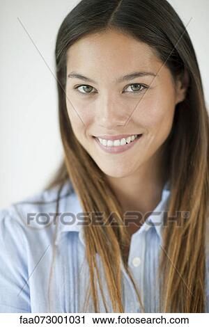 Stock Image - Young woman, portrait. Fotosearch