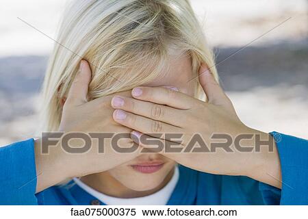 Boy with hands covering eyes View Large Photo Image Stock Photography - Boy with hands covering eyes. Fotosearch