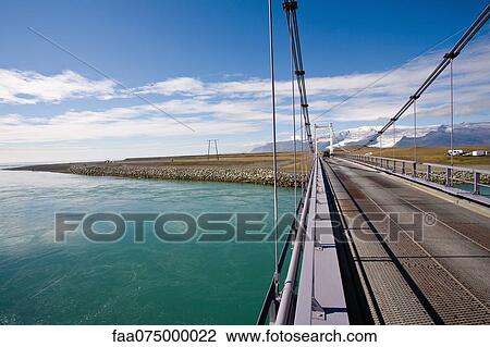 Bridge over Jokulsarlon glacial lagoon, Iceland View Large Photo Image Stock Image - Bridge over Jokulsarlon glacial lagoon, Iceland. Fotosearch