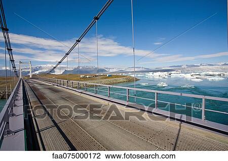 Bridge over Jokulsarlon glacial lagoon, Iceland View Large Photo Image Stock Image - Bridge over Jokulsarlon glacial lagoon, Iceland. Fotosearch