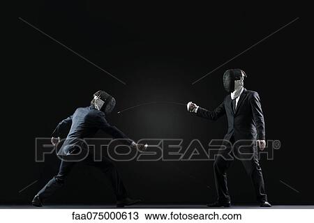 Stock Image - Businessmen fencing. Fotosearch