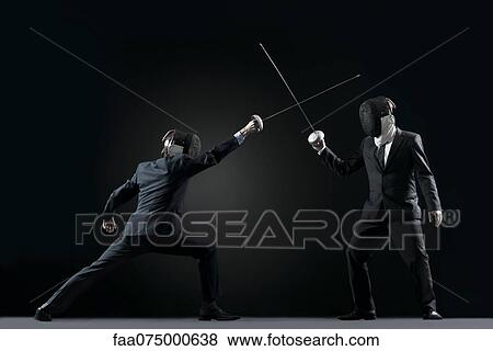 Businessmen fencing View Large Photo Image Stock Photo - Businessmen fencing. Fotosearch