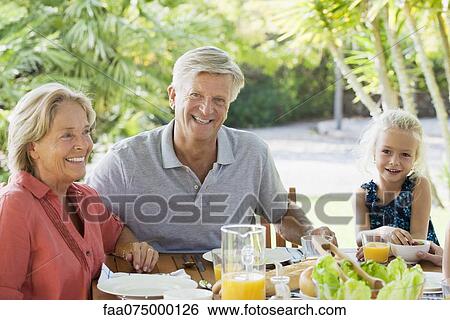 Girl and grandparents View Large Photo Image Stock Photograph - Girl and grandparents. Fotosearch