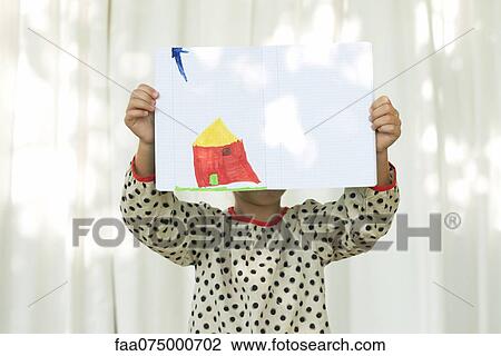 Girl holding marker drawing in front of face View Large Photo Image Stock Image - Girl holding marker drawing in front of face. Fotosearch