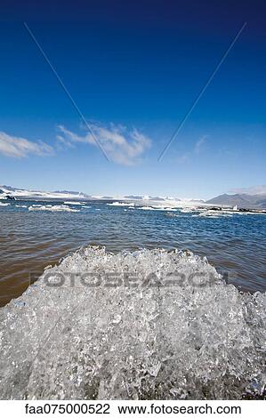 Ice melting in Jokulsarlon glacial lagoon, Iceland View Large Photo Image Stock Image - Ice melting in Jokulsarlon glacial lagoon, Iceland. Fotosearch