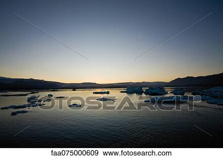 Iceland, Jokulsarlon glacial lagoon at twilight View Large Photo Image Stock Photo - Iceland, Jokulsarlon glacial lagoon at twilight. Fotosearch