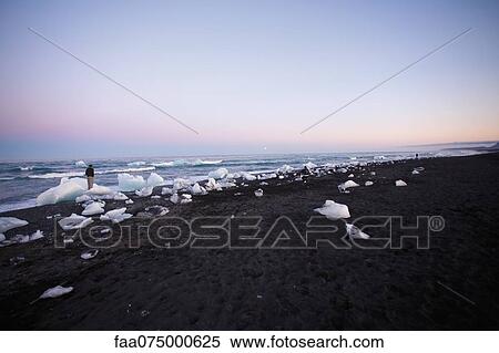 Large pieces of glacial ice washed up on beach, Jokulsarlon glacial lagoon, Iceland View Large Photo Image Stock Photography - Large pieces of glacial ice washed up on beach, Jokulsarlon glacial lagoon, Iceland. Fotosearch