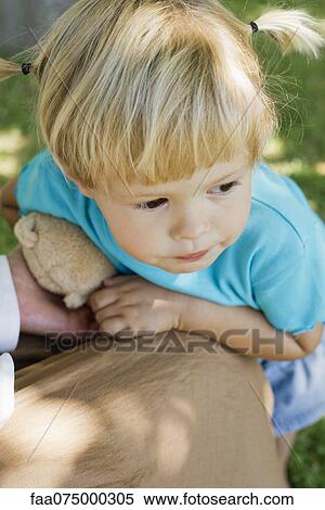 Stock Photography - Little girl, high angle view. Fotosearch