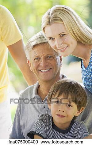 Senior man with adult daughter and grandson, portrait View Large Photo Image Stock Image - Senior man with adult daughter and grandson, portrait. Fotosearch