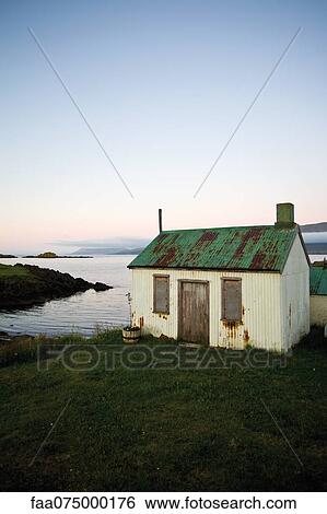 Shed at water's edge, Vopnafjordur, Austurland, Iceland View Large Photo Image Stock Photograph - Shed at water's edge, Vopnafjordur, Austurland, Iceland. Fotosearch