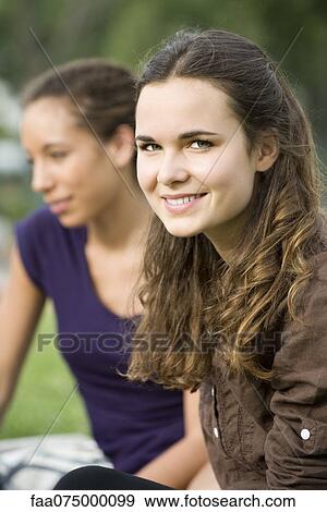Smiling young woman View Large Photo Image Stock Photo - Smiling young woman. Fotosearch