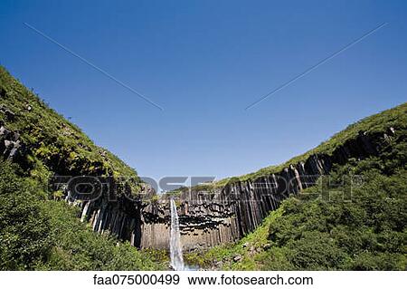 Svartifoss waterfall and basalt columns, Skaftafell National Park, Iceland View Large Photo Image Stock Photo - Svartifoss waterfall and basalt columns, Skaftafell National Park, Iceland. Fotosearch