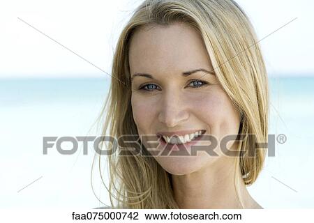 Woman smiling, portrait View Large Photo Image Stock Image - Woman smiling, portrait. Fotosearch