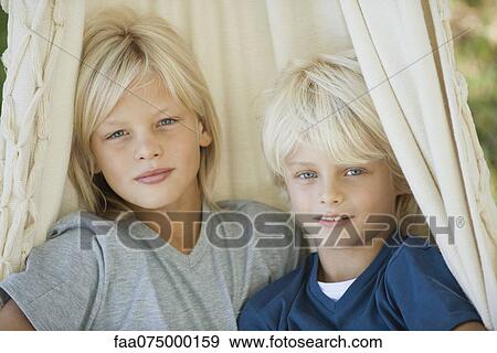 Young brothers, portrait View Large Photo Image Stock Photo - Young brothers, portrait. Fotosearch