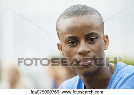 Stock Photo - Young man, portrait. Fotosearch
