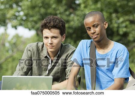 Young men outdoors View Large Photo Image Stock Photography - Young men outdoors. Fotosearch
