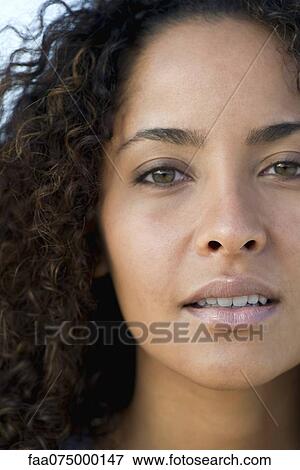 Young woman, close-up portrait View Large Photo Image Stock Photo - Young woman, close-up portrait. Fotosearch
