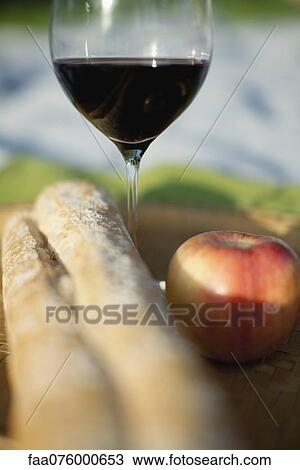 Apple, glass of wine and bread View Large Photo Image Stock Image - Apple, glass of wine and bread. Fotosearch