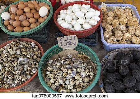 Assorted eggs for sale in market View Large Photo Image Stock Photo - Assorted eggs for sale in market. Fotosearch