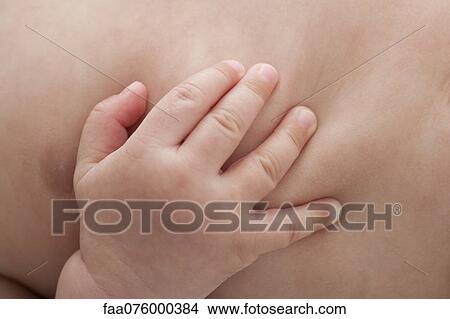 Baby's hand, close-up View Large Photo Image Picture - Baby's hand, close-up. Fotosearch