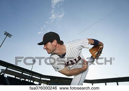Baseball player pitching View Large Photo Image Stock Photograph - Baseball player pitching. Fotosearch