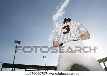 Stock Photo - Baseball player, rear view. Fotosearch