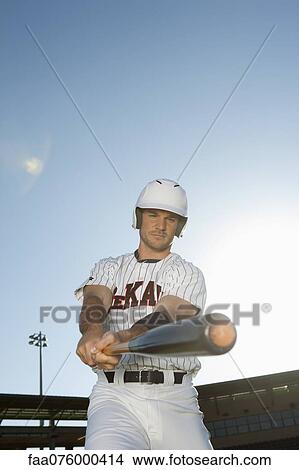 Picture - Baseball player swinging bat. Fotosearch