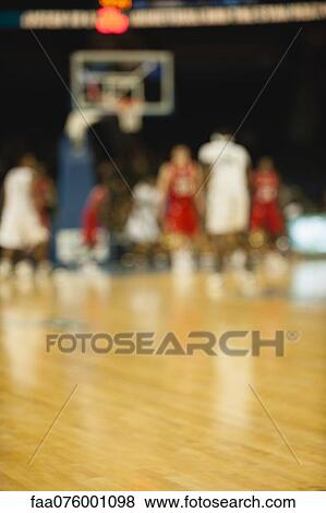 Stock Photo - Basketball game, defocused. Fotosearch