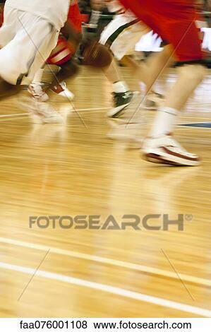 Basketball game in progress, cropped View Large Photo Image Stock Photo - Basketball game in progress, cropped. Fotosearch