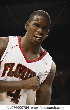 Picture - Basketball player cheering. Fotosearch