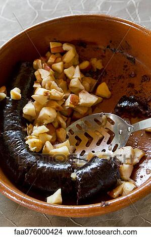 Black pudding and potatoes in bowl View Large Photo Image Picture - Black pudding and potatoes in bowl. Fotosearch