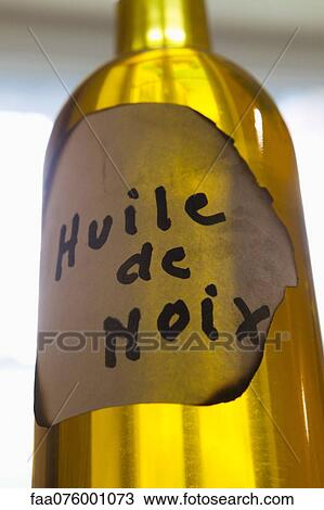 Stock Image - Bottle of walnut oil. Fotosearch