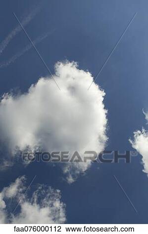 Clouds in blue sky View Large Photo Image Stock Image - Clouds in blue sky. Fotosearch