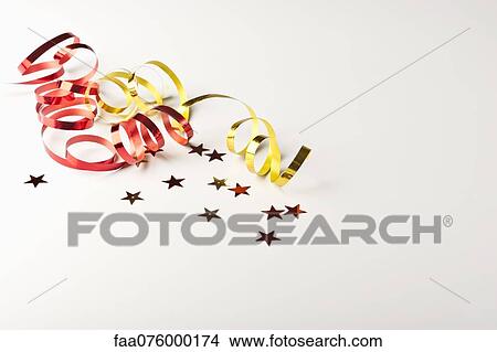 Confetti and gift-wrap ribbon View Large Photo Image Picture - Confetti and gift-wrap ribbon. Fotosearch