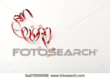 Stock Photo - Confetti and gift-wrap ribbon. Fotosearch