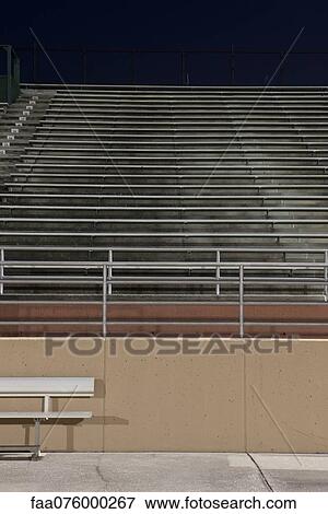Empty bleachers at night View Large Photo Image Stock Photo - Empty bleachers at night. Fotosearch