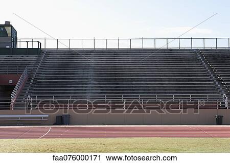 Stock Image - Empty stadium and running track. Fotosearch