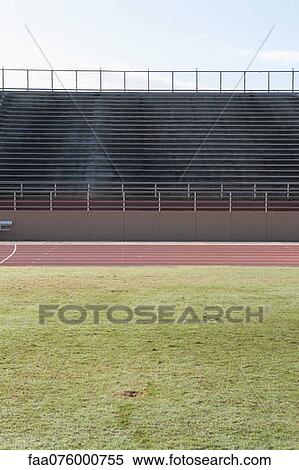 Stock Photography - Empty stadium and running track. Fotosearch