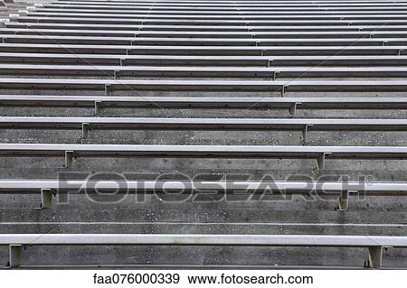 Stock Photo - Empty stadium bleachers. Fotosearch