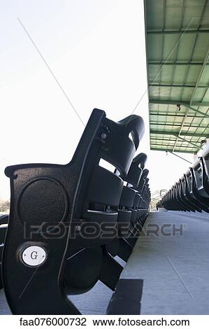 Stock Image - Empty stadium seating. Fotosearch